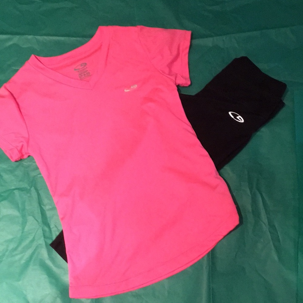 Pink neon sport  shirt and black sport capris.